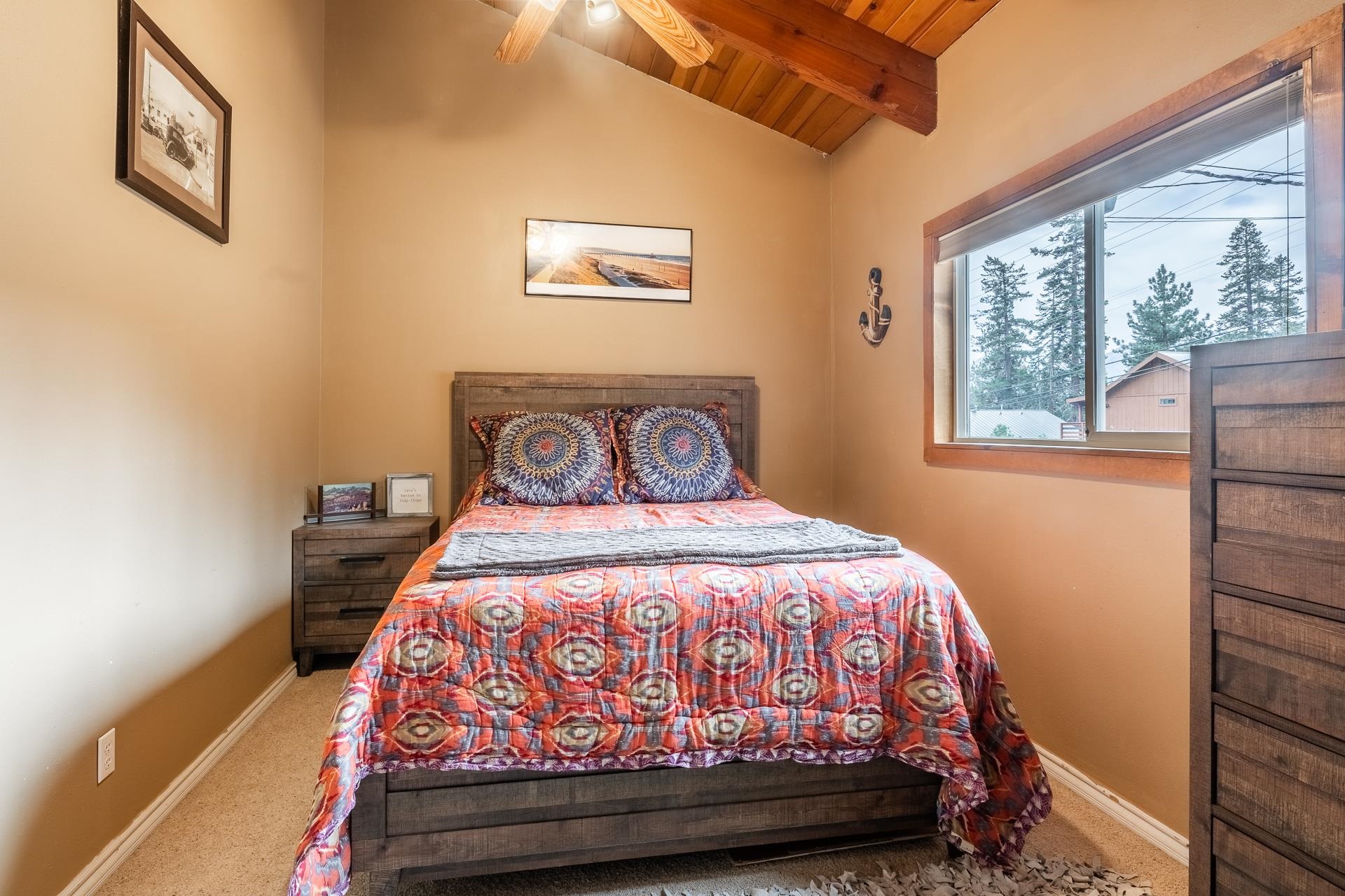 182 Davison Road Mammoth Lakes, CA 93546 - Photo 15 of 25 a bed sitting in a bedroom next to a window