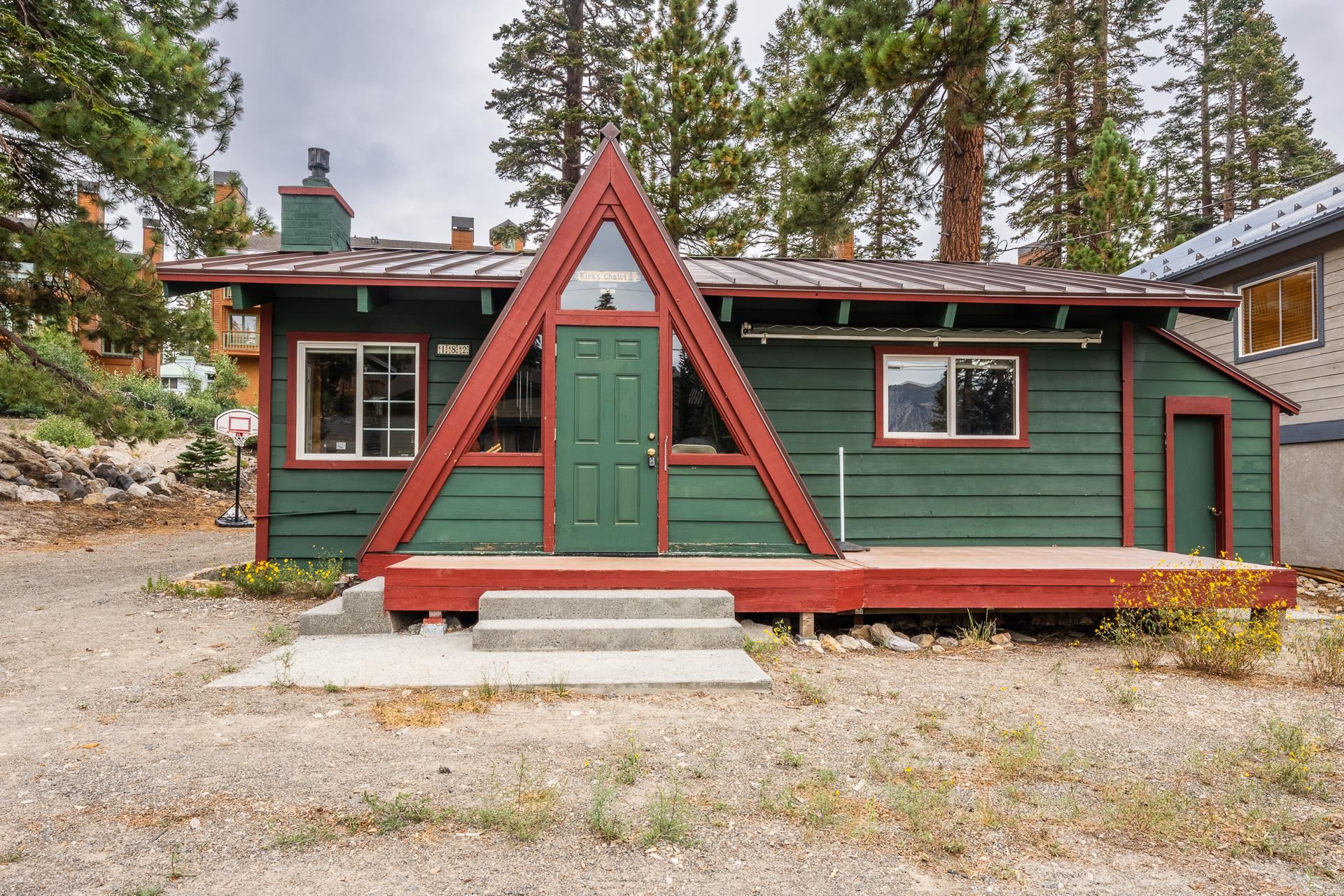 182 Davison Road Mammoth Lakes, CA 93546 - Photo 2 of 25 a view of backyard with a deck and a slide