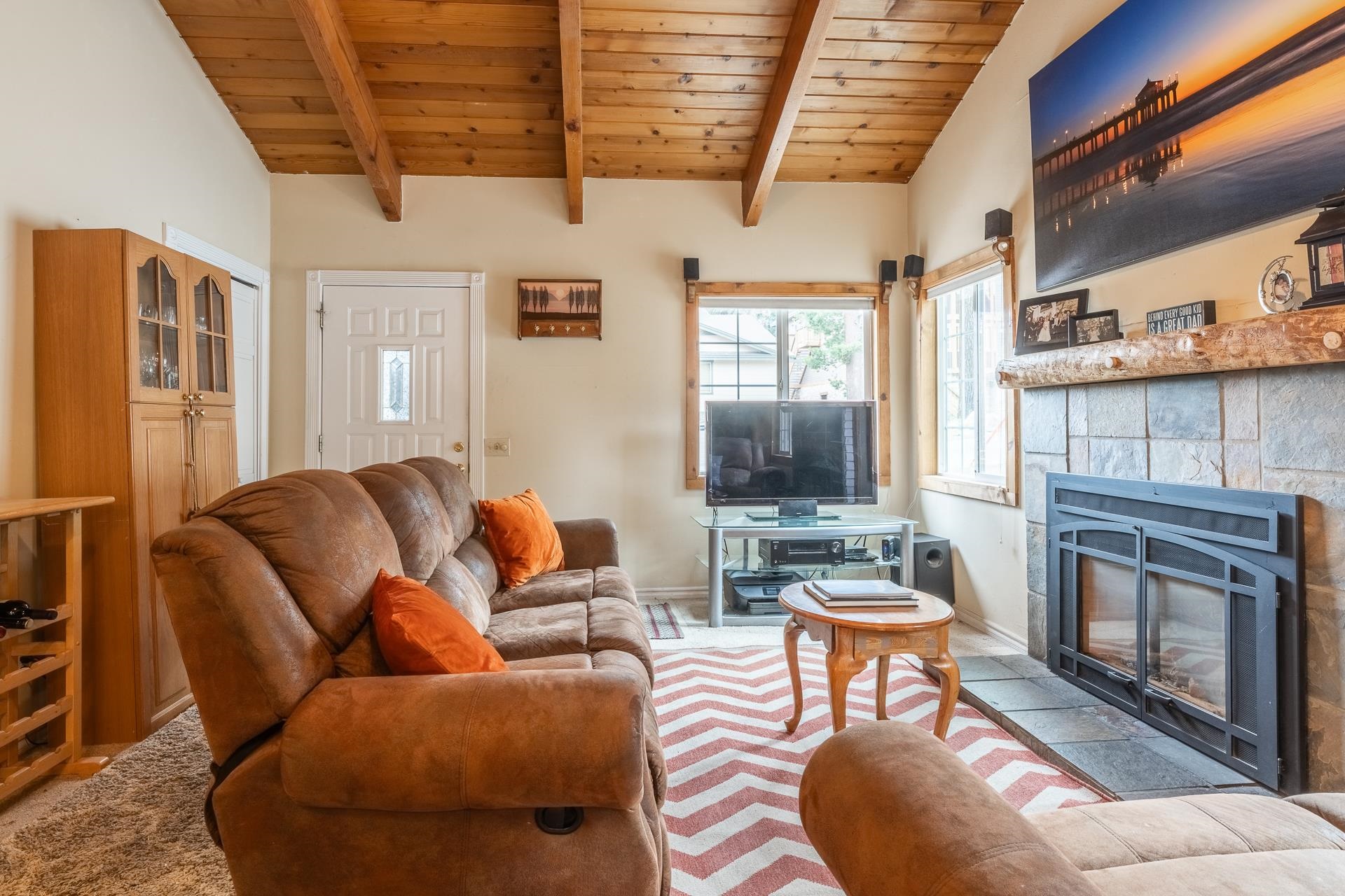 182 Davison Road Mammoth Lakes, CA 93546 - Photo 4 of 25 a outdoor living space with furniture a fireplace and a window