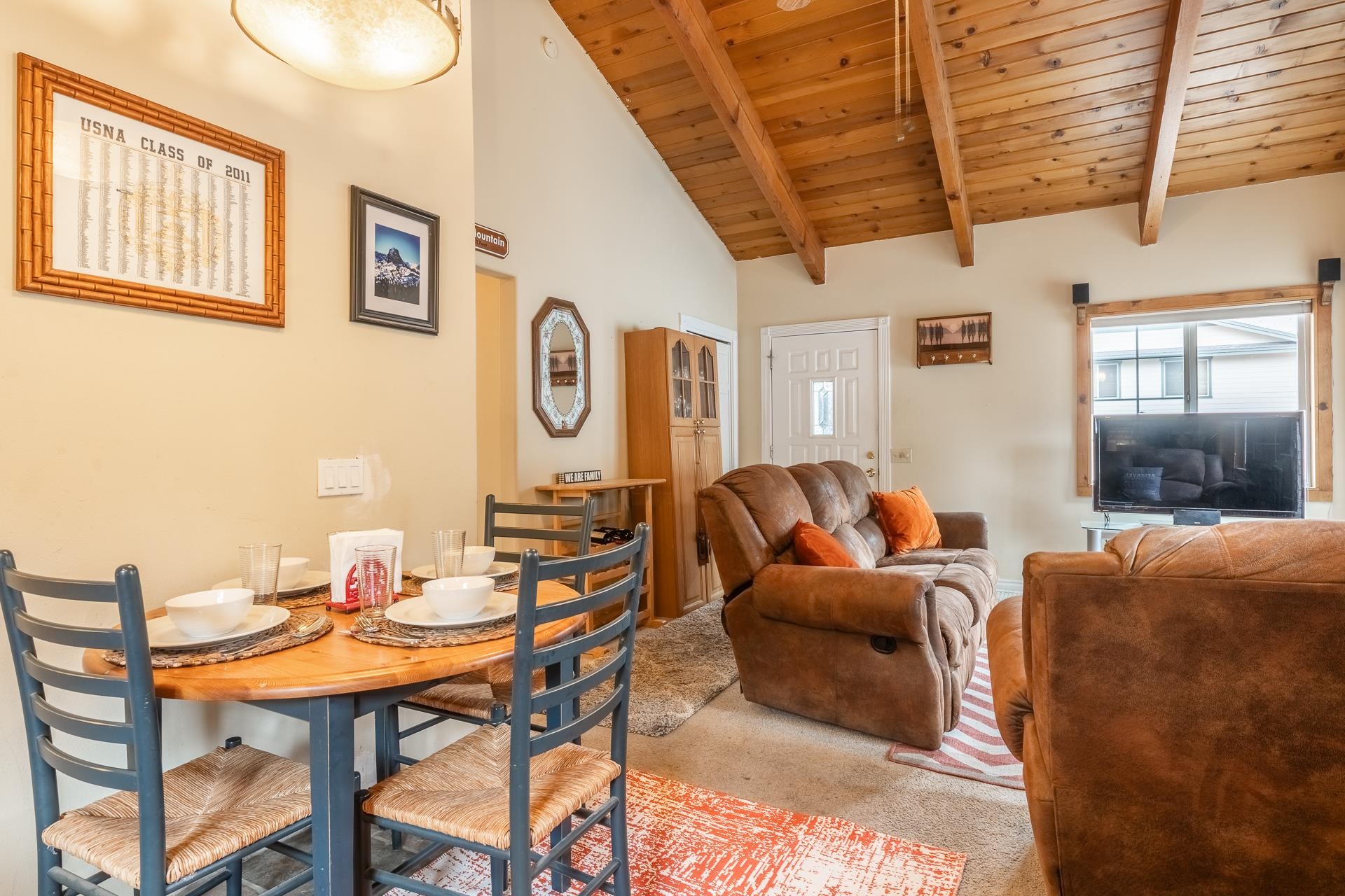 182 Davison Road Mammoth Lakes, CA 93546 - Photo 7 of 25 a living room with furniture a wall painting and a window