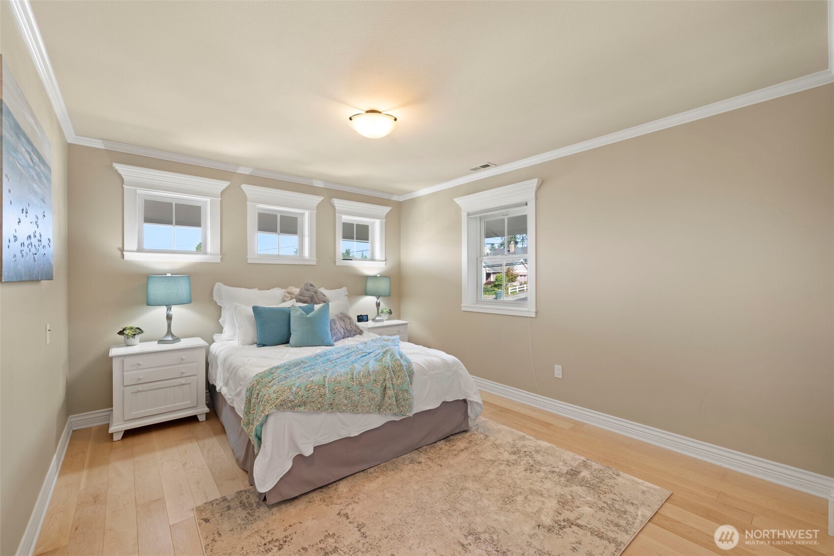 816 Walnut Street Edmonds, WA 98020 - Photo 22 of 32 a bedroom with a bed lamp and a window