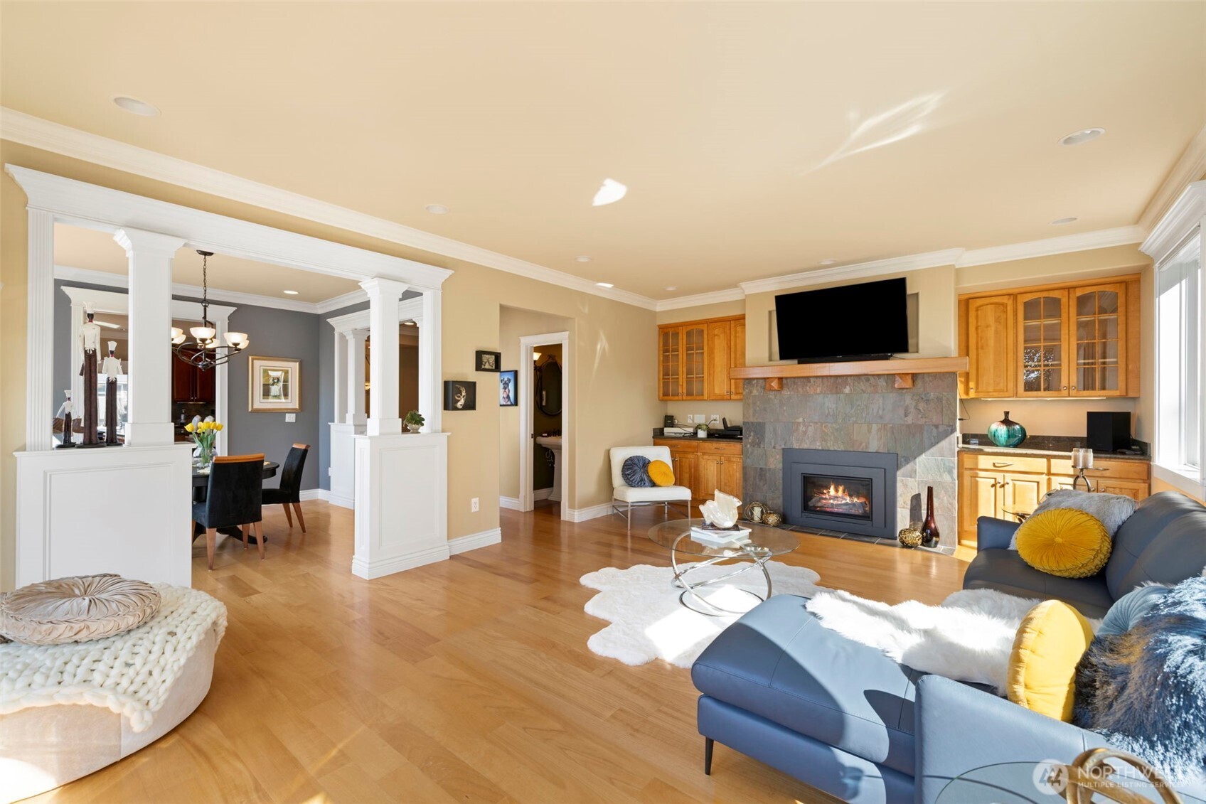 816 Walnut Street Edmonds, WA 98020 - Photo 9 of 32 a living room with furniture a fireplace and a flat screen tv