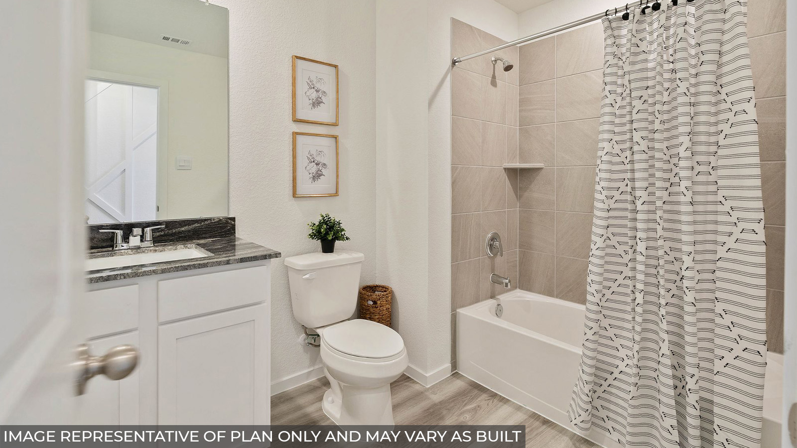 376 Old Stage Coach Road Jarrell, TX 76537 - Photo 19 of 21 A well-appointed bathroom featuring a contemporary vanity with a granite countertop and a tiled shower-tub combination.
