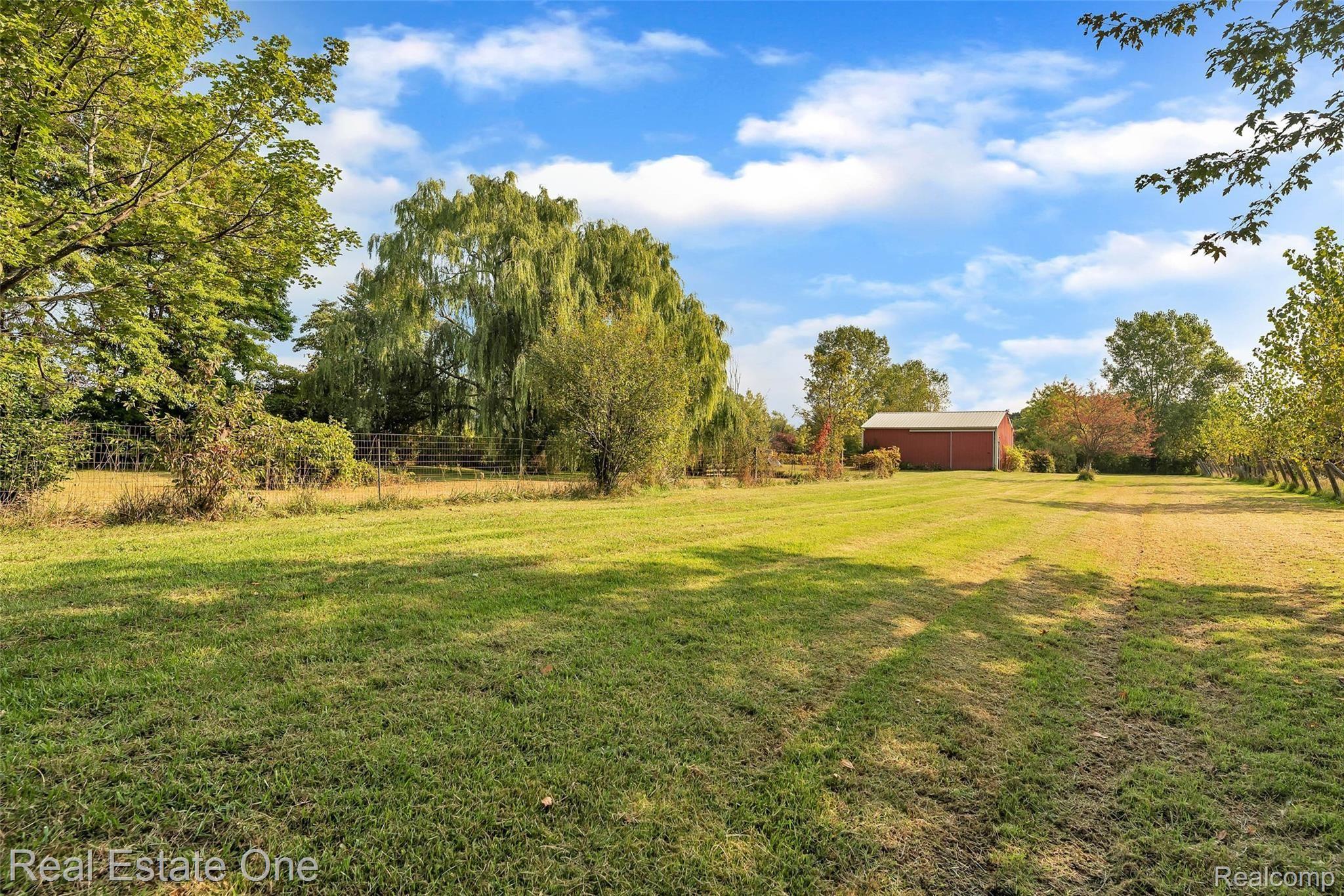 5400 North Fleming Road Fowlerville, MI 48836 - Photo 38 of 40 43-5400 Fleming Rd-WindowStill-Real.jpg