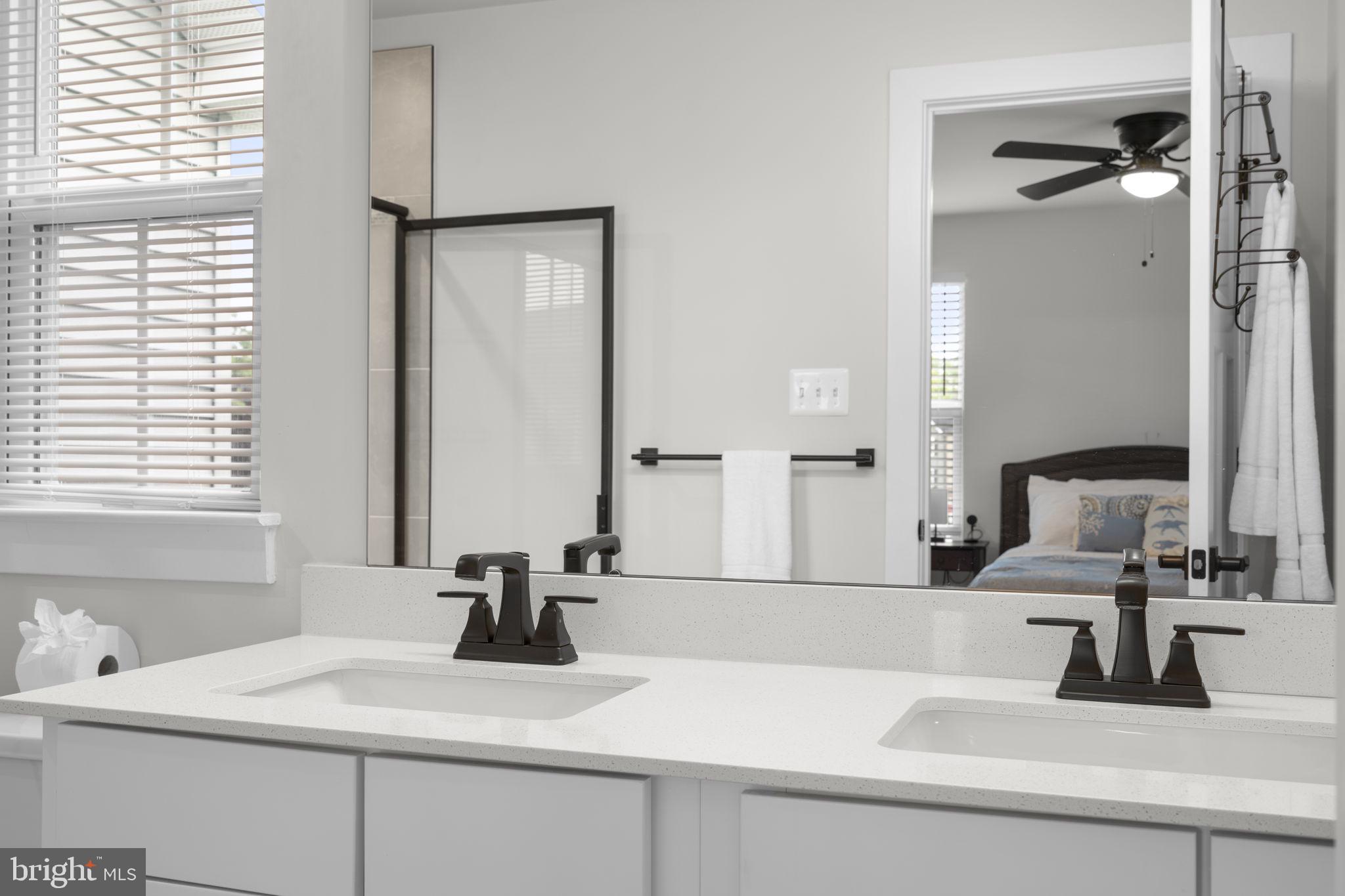 1713 Aurora Way Frederick, MD 21702 - Photo 34 of 57 a bathroom with a sink and a mirror