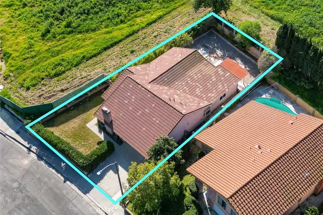 a small on the roof deck with a yard