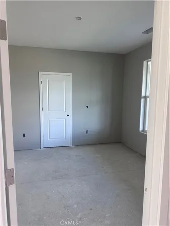 an empty room with window