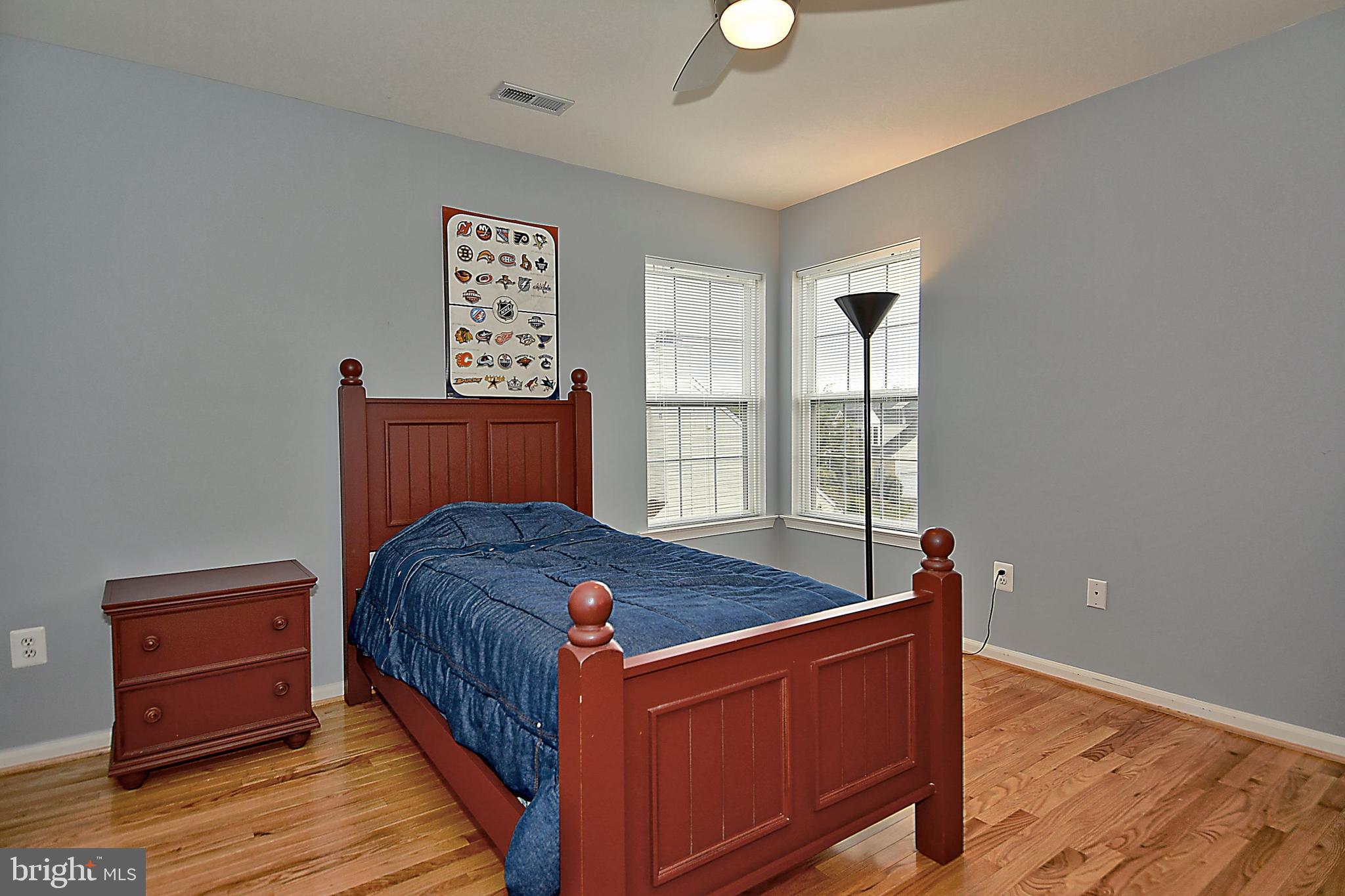 13935 Falconcrest Road Germantown, MD 20874 - Photo 22 of 51 BEDROOM W/CEILING FAN & HARDWOOD FLOORS