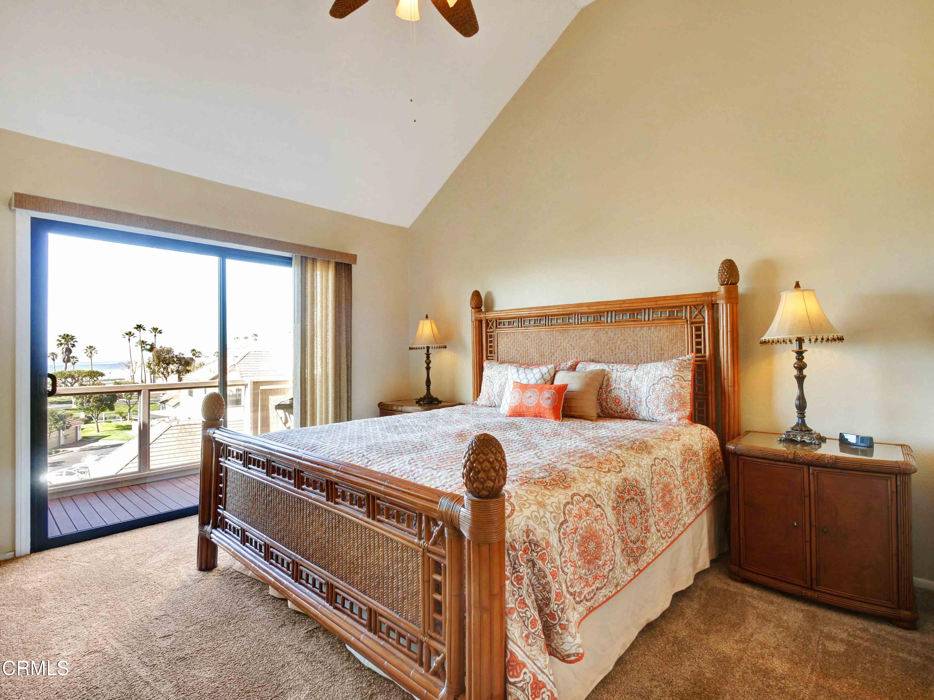 558 Terrace View Place Port Hueneme, CA 93041 - Photo 26 of 52 a bedroom with a bed and large windows