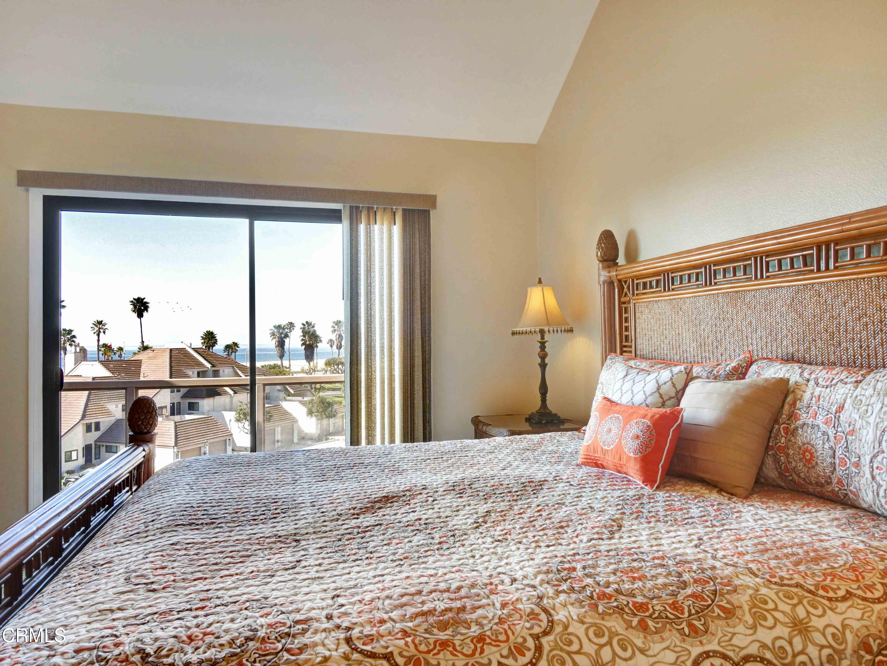 558 Terrace View Place Port Hueneme, CA 93041 - Photo 27 of 52 a bedroom with a large bed and a window