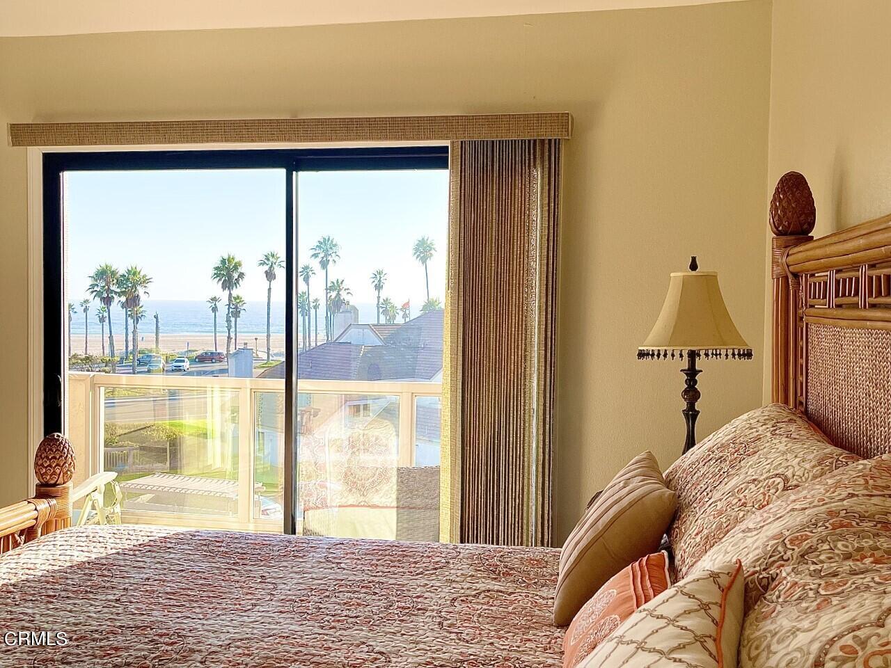 558 Terrace View Place Port Hueneme, CA 93041 - Photo 28 of 52 a bedroom with a bed and a large window