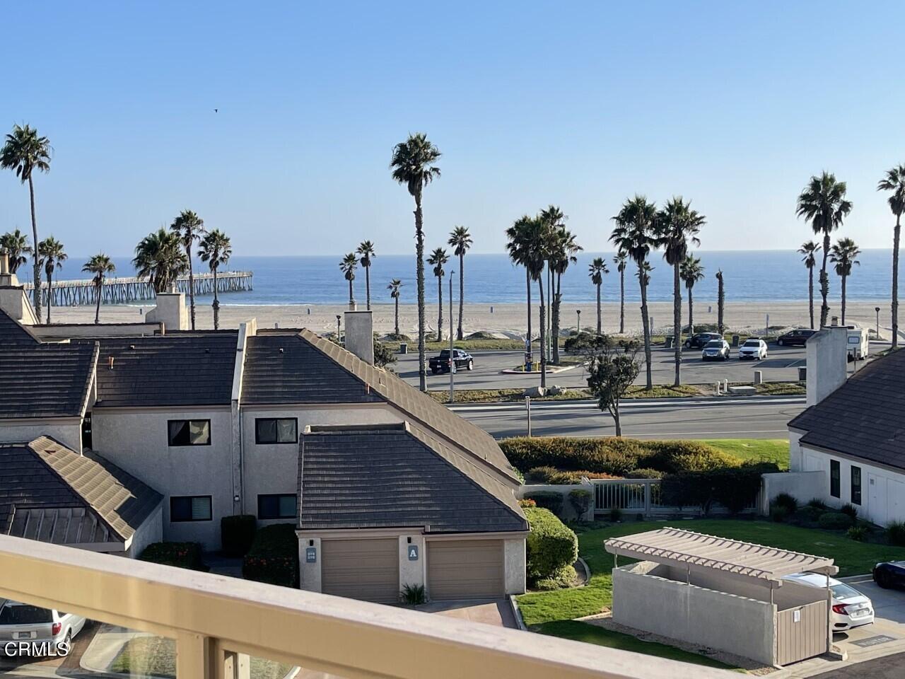 558 Terrace View Place Port Hueneme, CA 93041 - Photo 29 of 52 a view of swimming pool with outdoor seating and a palm tree
