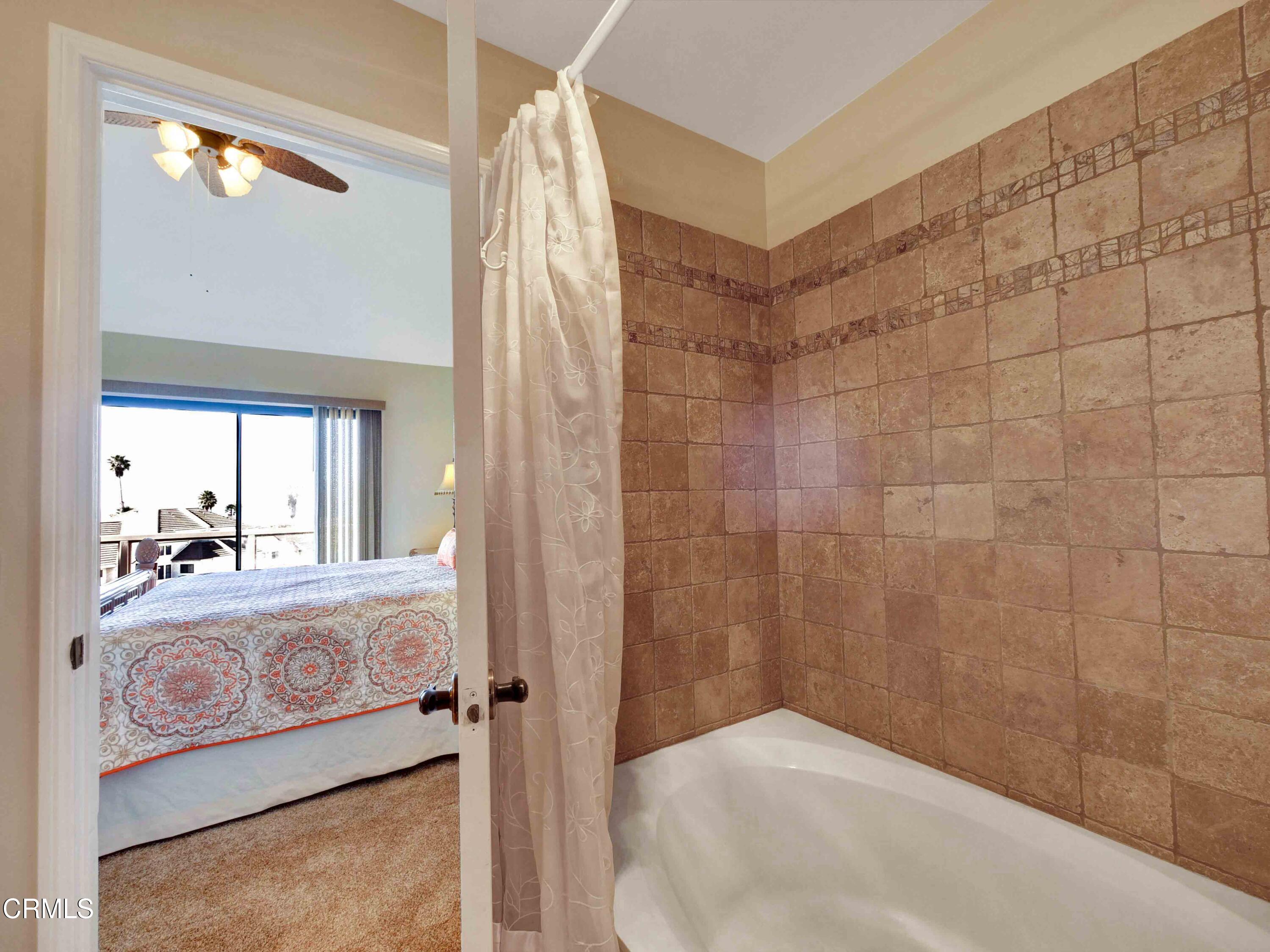 558 Terrace View Place Port Hueneme, CA 93041 - Photo 35 of 52 a bathroom with a granite countertop shower and a sink