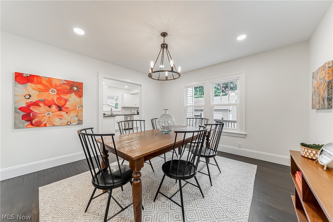 3947 Rosemond Road Cleveland Heights, OH 44121 - Photo 11 of 44 Dining room featuring an inviting chandelier and hardwood / wood-style floors