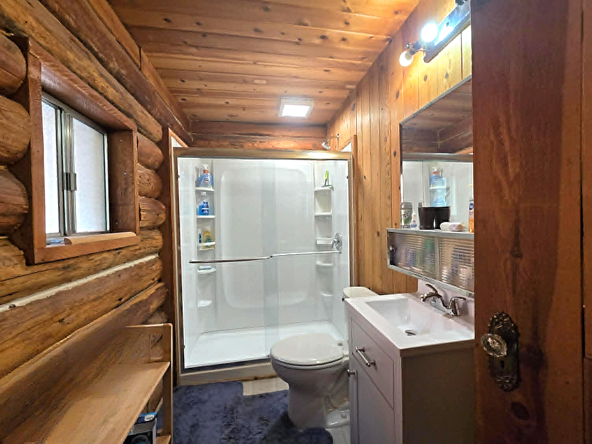 836 Ulrich Road Prospect, OR 97536 - Photo 19 of 47 a bathroom with a sink a toilet and shower