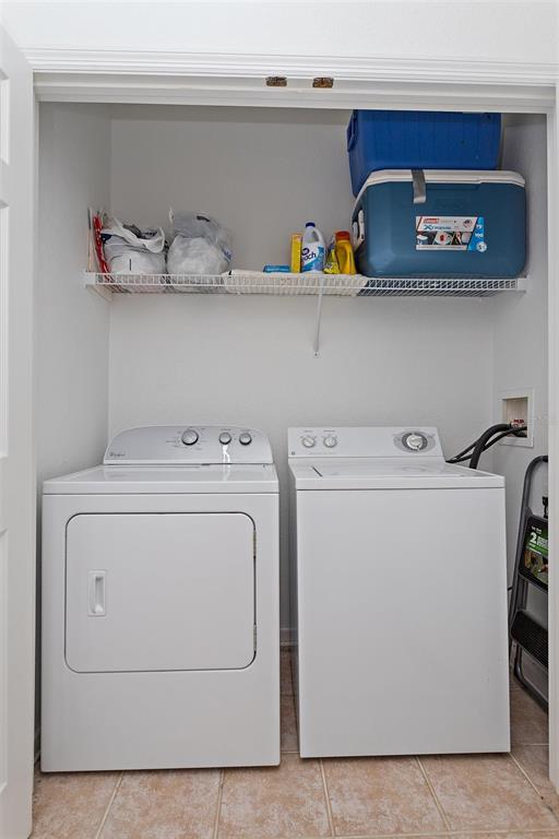 2307 Silver Palm Drive, Unit 202 Kissimmee, FL 34747 - Photo 18 of 34 a utility room with dryer and washer