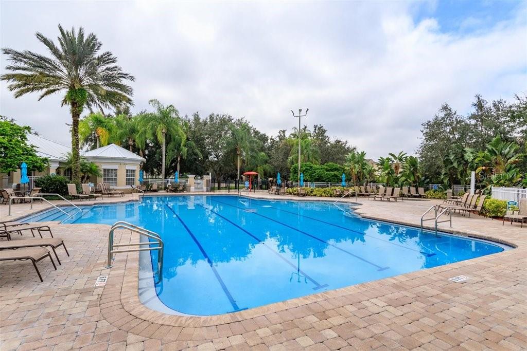 2307 Silver Palm Drive, Unit 202 Kissimmee, FL 34747 - Photo 22 of 34 a view of a swimming pool with lounge chair