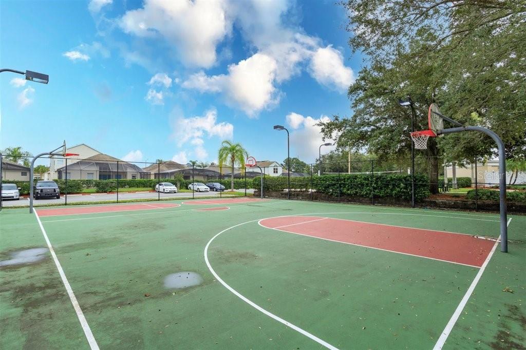 2307 Silver Palm Drive, Unit 202 Kissimmee, FL 34747 - Photo 25 of 34 a view of a playground with basketball court