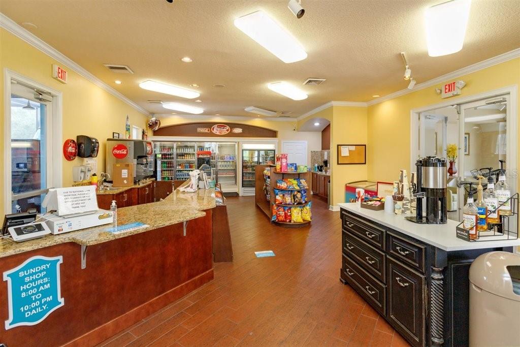 2307 Silver Palm Drive, Unit 202 Kissimmee, FL 34747 - Photo 34 of 34 a kitchen with stainless steel appliances kitchen island granite countertop a stove and cabinets