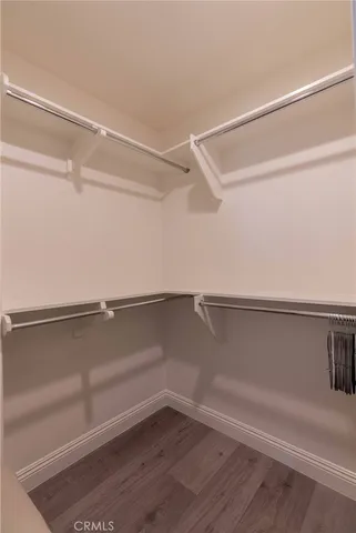 a view of an empty walk in closet