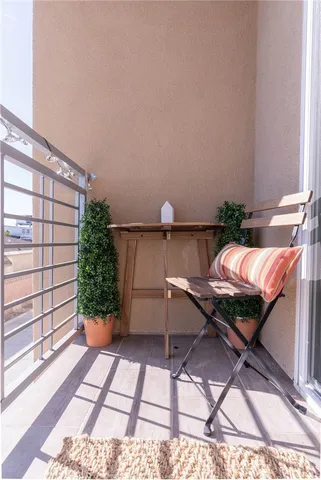 a backyard of a house with outdoor seating