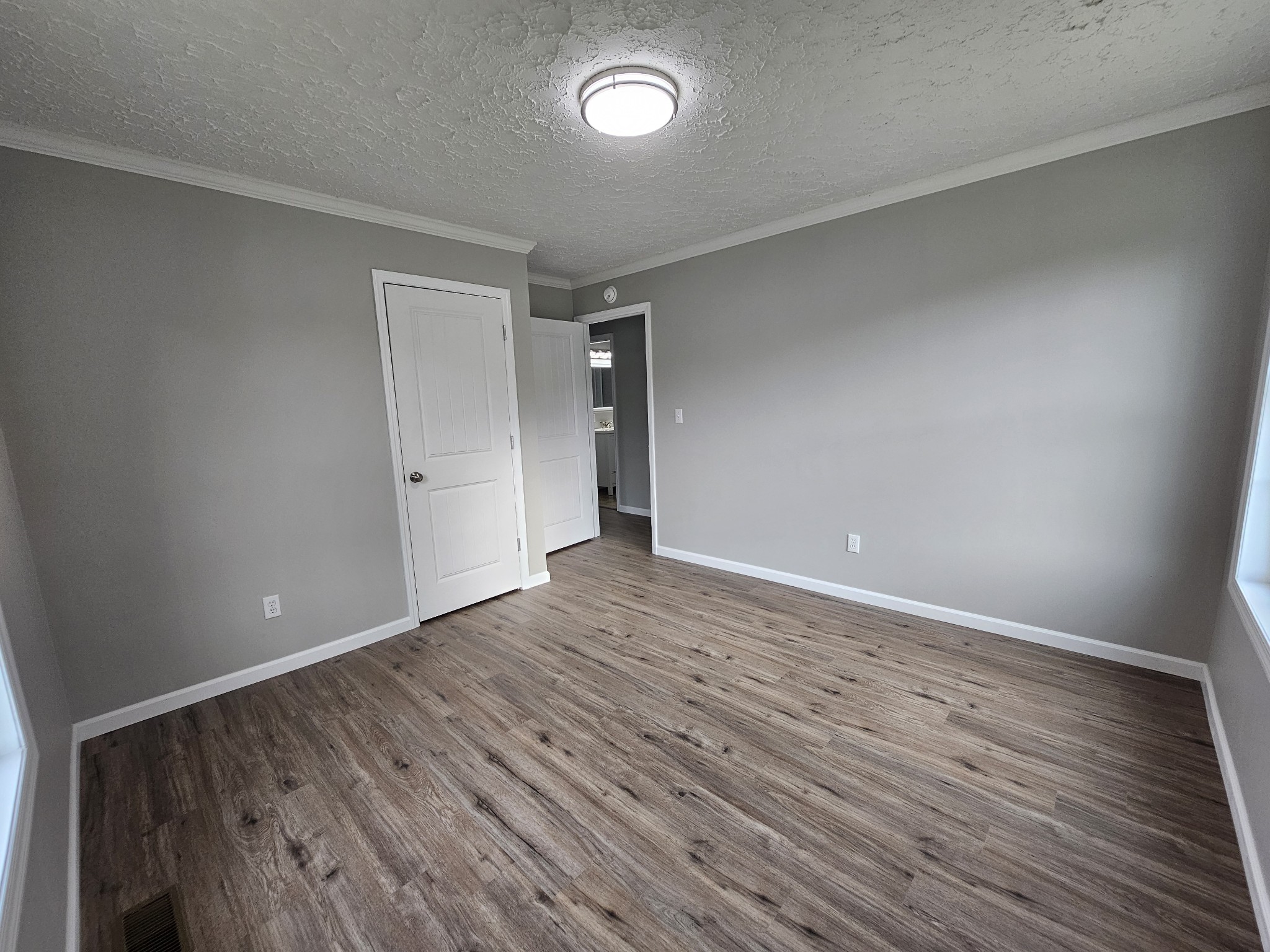 362 Forest Point Road Monteagle, TN 37356 - Photo 39 of 42 a view of an empty room with wooden floor and a window