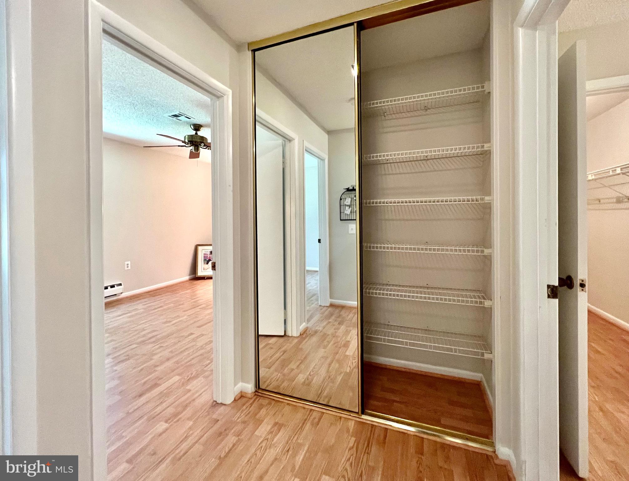 3413 St Leonards Court, Unit 110A Silver Spring, MD 20906 - Photo 25 of 50 Large hall linen closet.