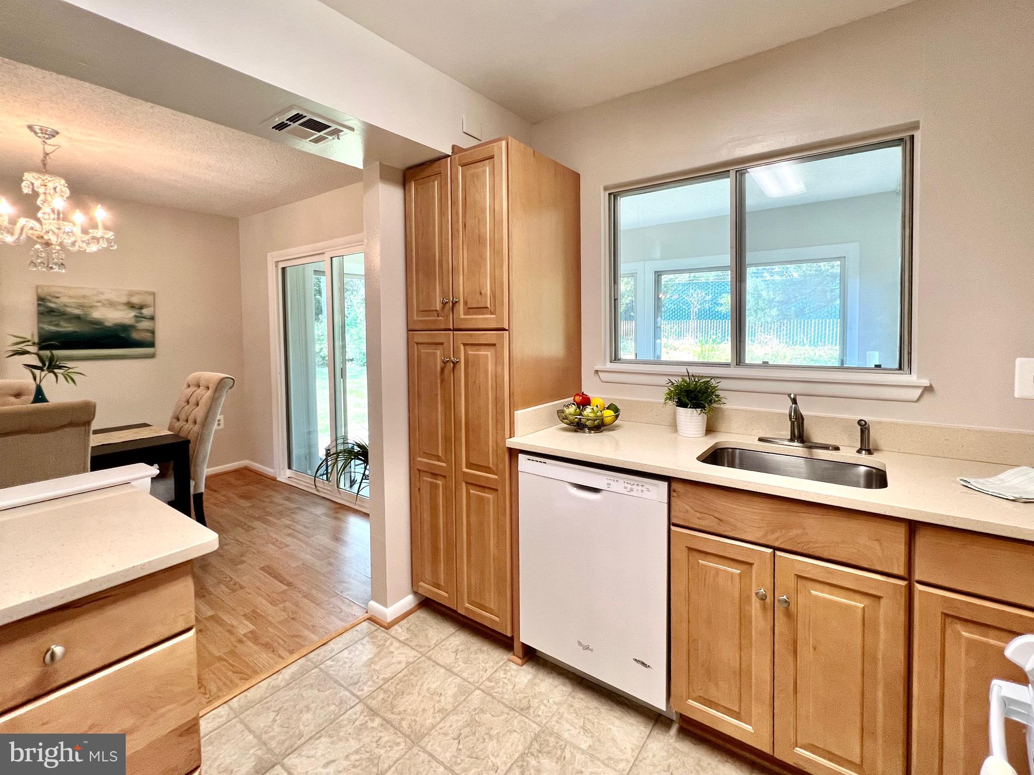 3413 St Leonards Court, Unit 110A Silver Spring, MD 20906 - Photo 8 of 50 Solid surface counters & soft-close drawers.