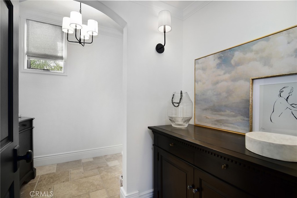 4947 Summit View Drive Westlake Village, CA 91362 - Photo 19 of 61 a bathroom with a sink a light fixture and a mirror