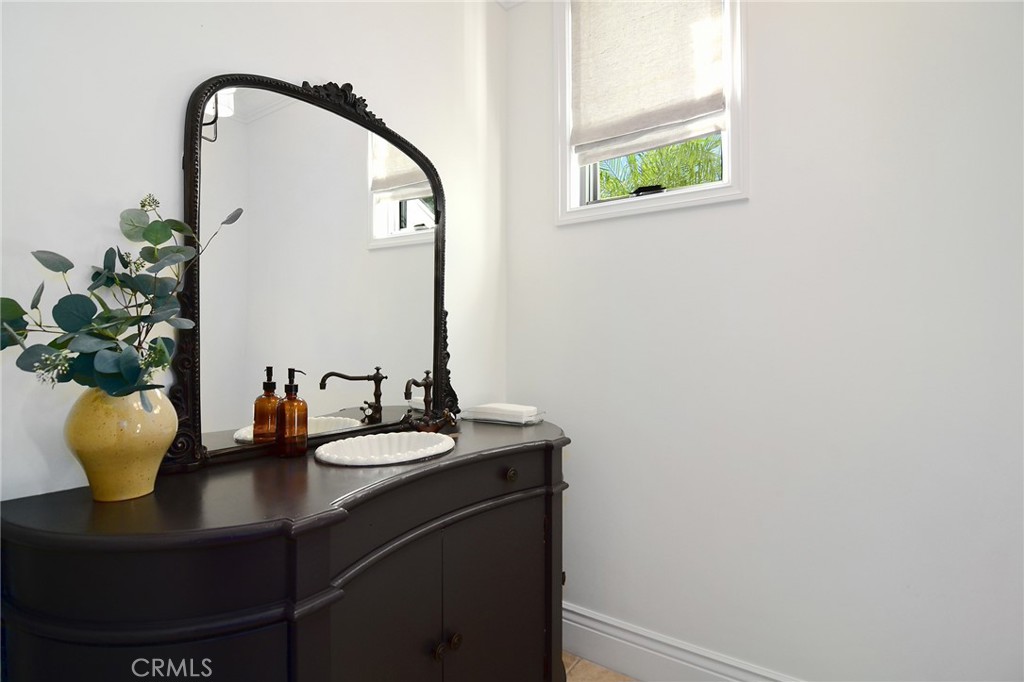 4947 Summit View Drive Westlake Village, CA 91362 - Photo 20 of 61 a bathroom with a sink and a mirror