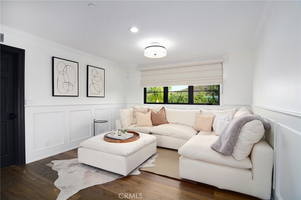 4947 Summit View Drive Westlake Village, CA 91362 - Photo 24 of 61 a living room with furniture and a large window