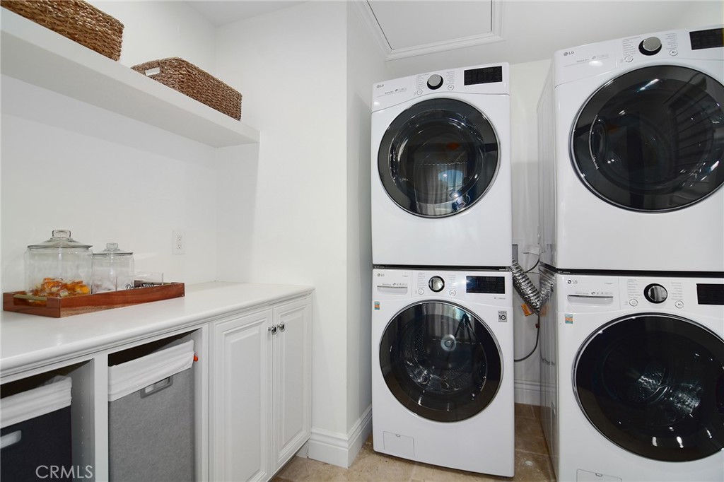 4947 Summit View Drive Westlake Village, CA 91362 - Photo 32 of 61 a utility room with dryer and washer