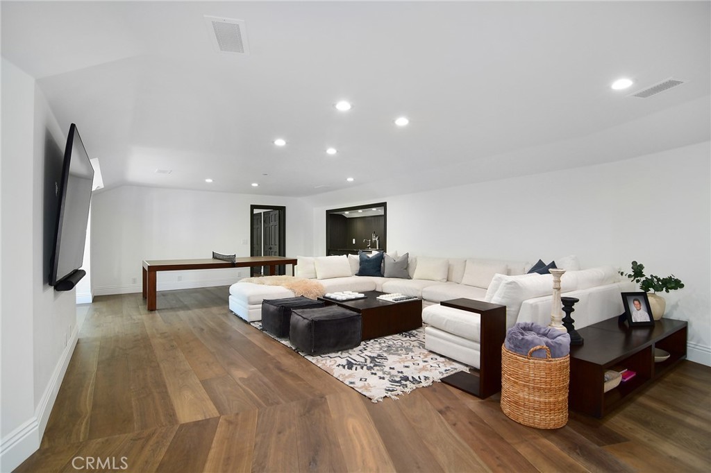 4947 Summit View Drive Westlake Village, CA 91362 - Photo 55 of 61 a living room with furniture and a table