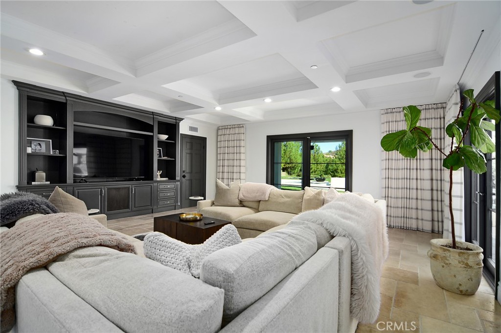 4947 Summit View Drive Westlake Village, CA 91362 - Photo 10 of 61 a living room with furniture and a flat screen tv