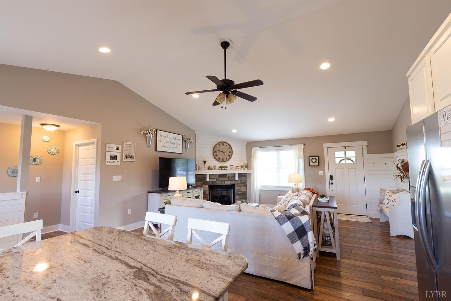 2490 Red House Road Rustburg, VA 24588 - Photo 6 of 33 a living room with furniture and a wooden floor