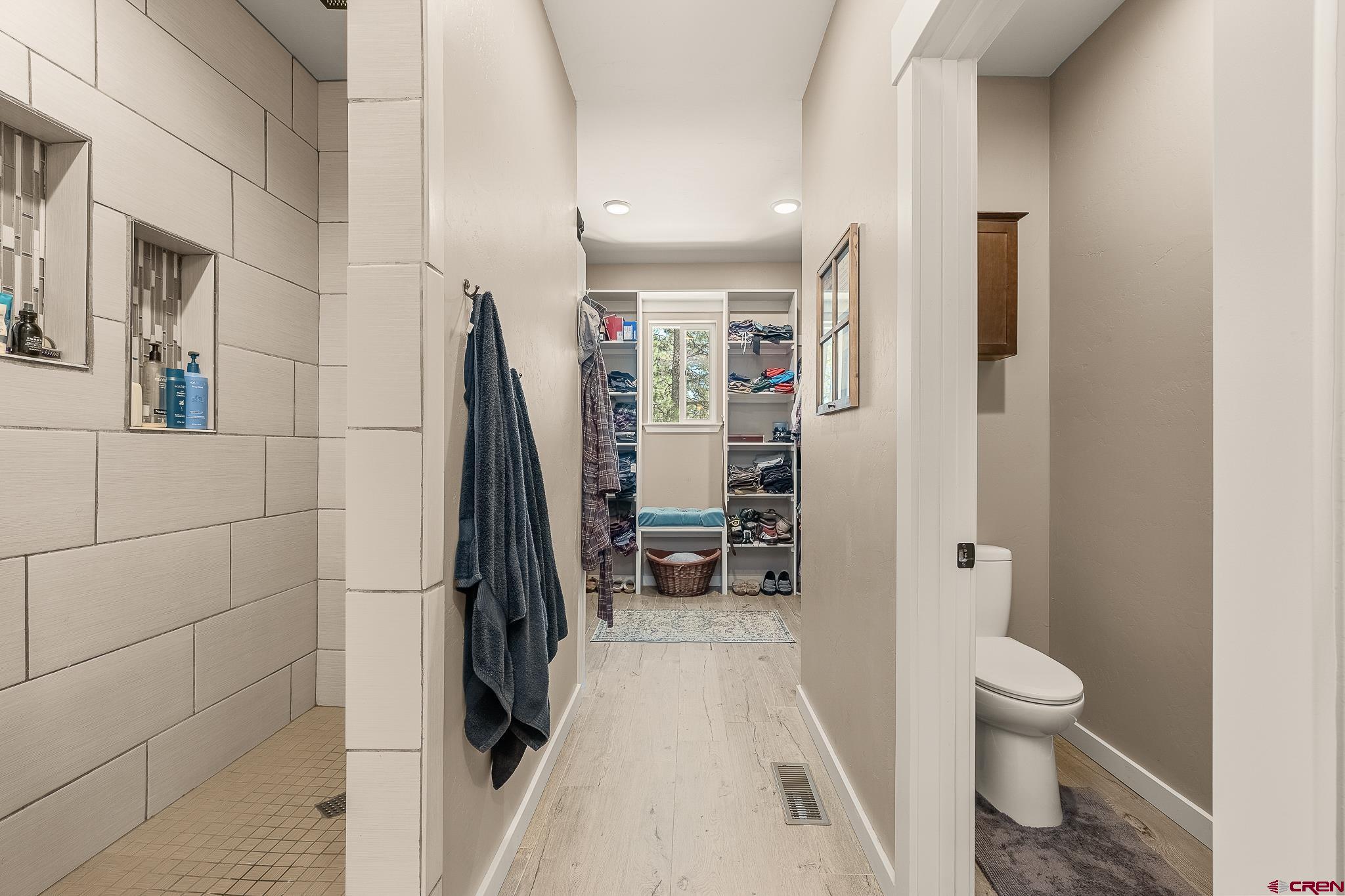 671 Sierra Circle Durango, CO 81301 - Photo 23 of 35 a bathroom with a sink toilet and shower