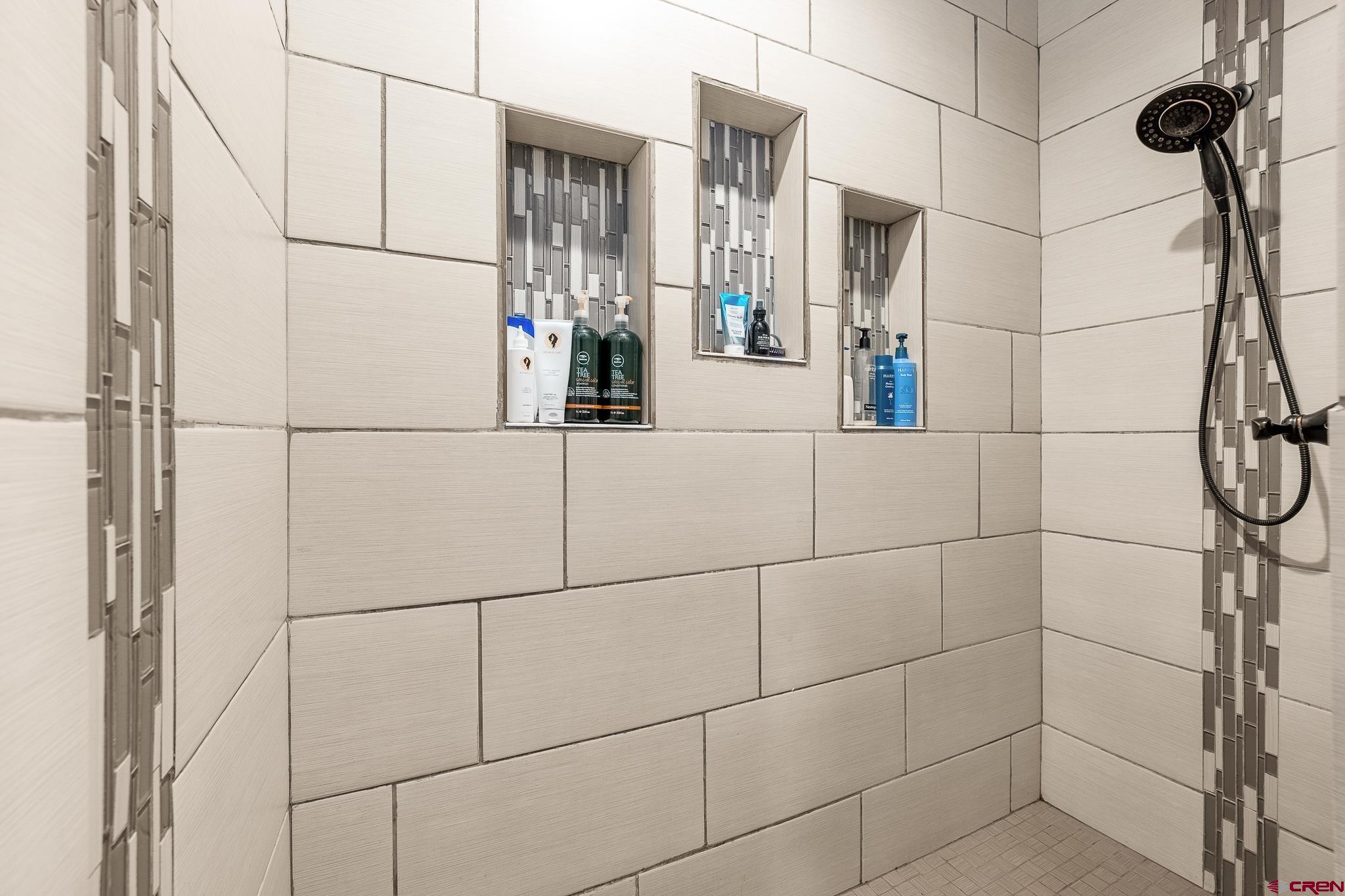 671 Sierra Circle Durango, CO 81301 - Photo 24 of 35 a bathroom with a shower