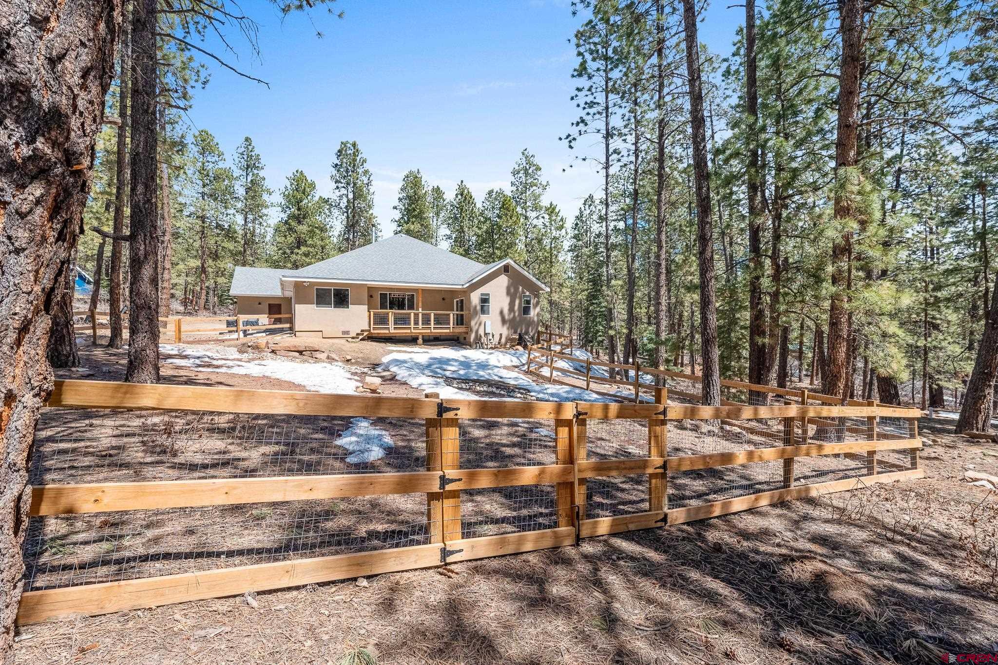 671 Sierra Circle Durango, CO 81301 - Photo 4 of 35 a view of a house with backyard of house