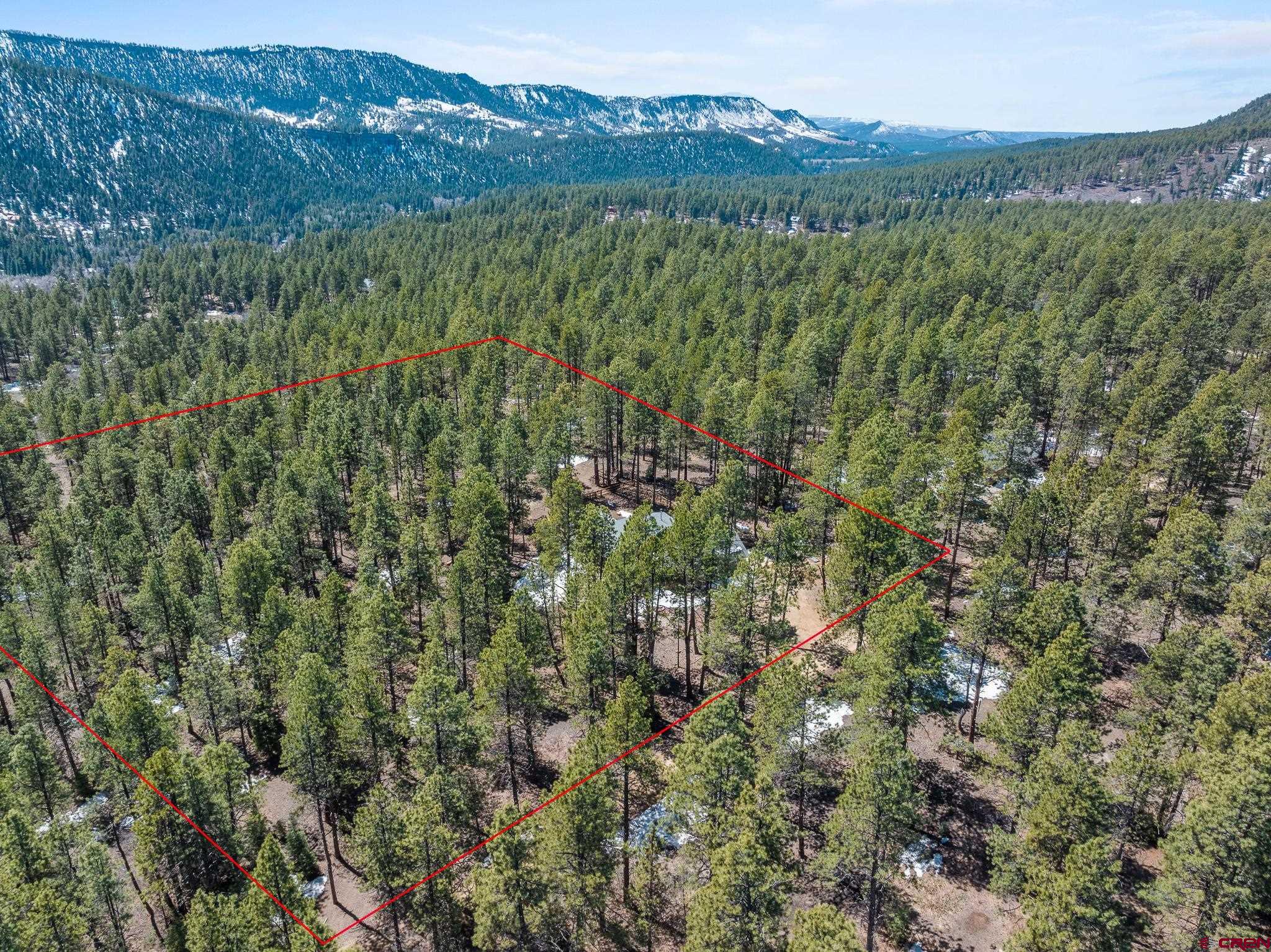 671 Sierra Circle Durango, CO 81301 - Photo 6 of 35 a view of a lake with a mountain in the background