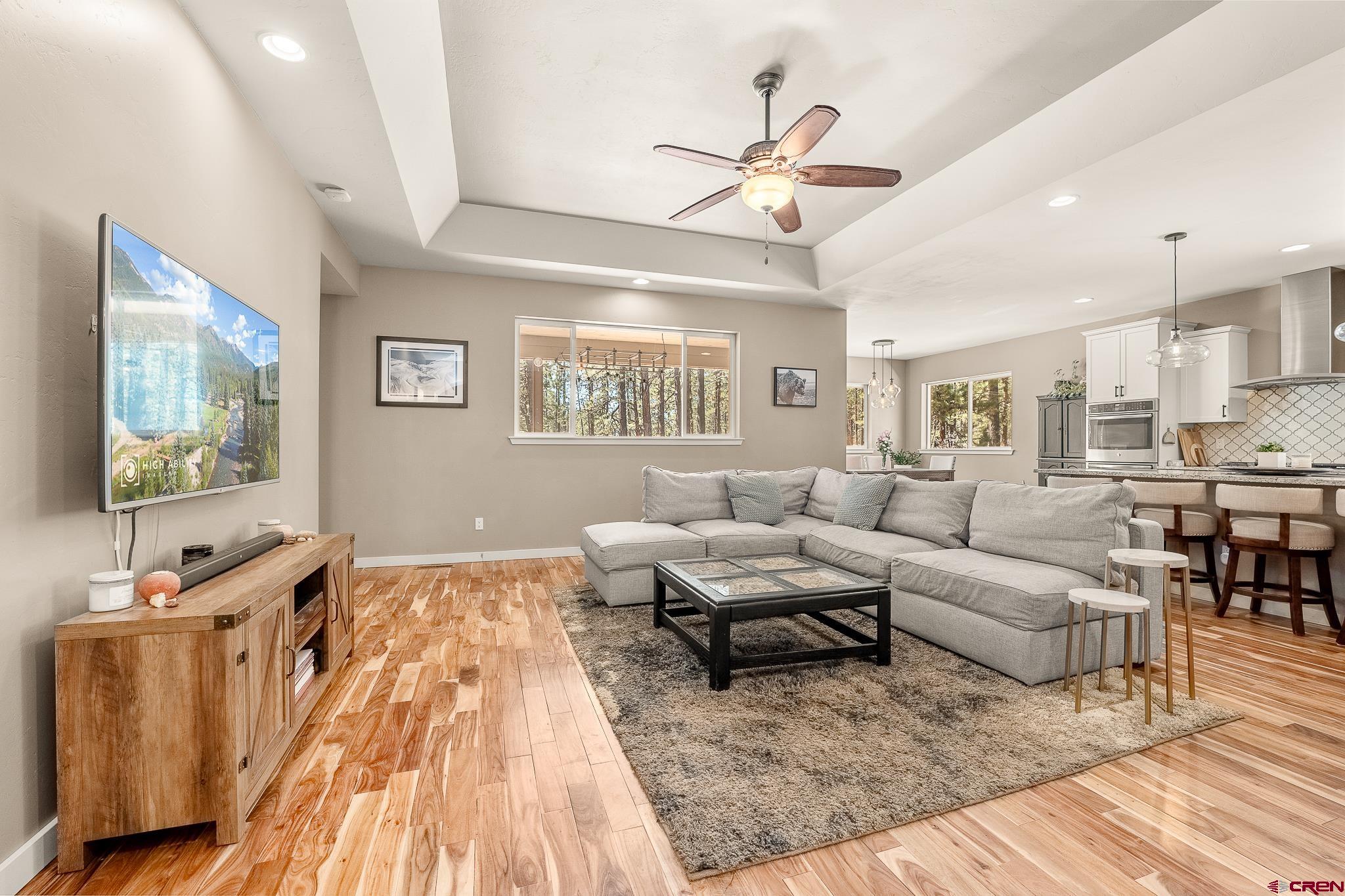 671 Sierra Circle Durango, CO 81301 - Photo 7 of 35 a living room with furniture and a flat screen tv