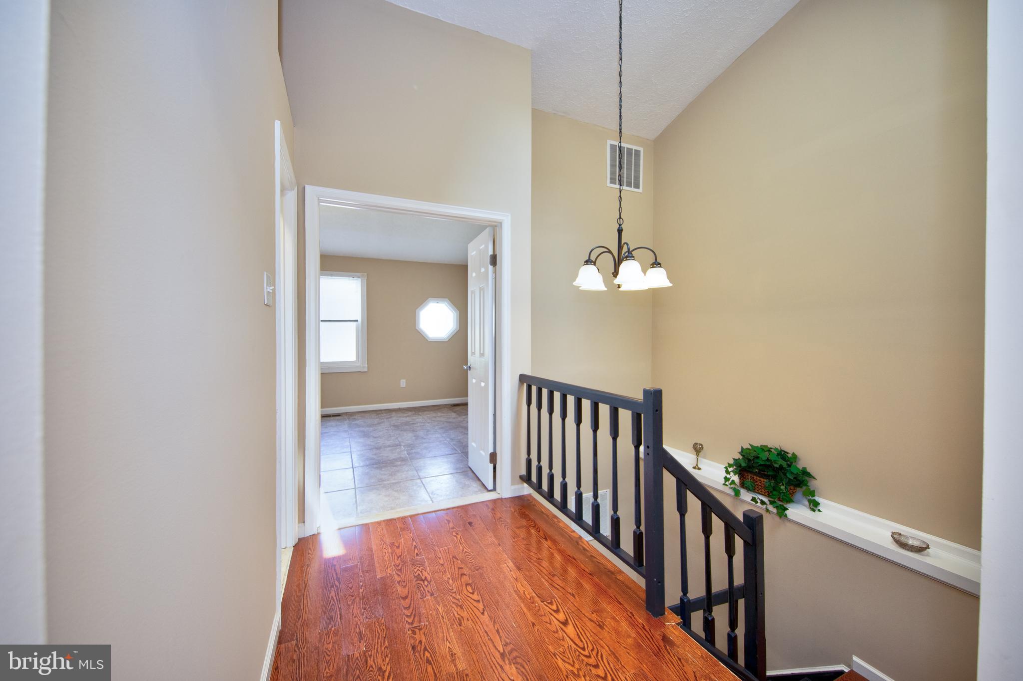 8728 Silver Hall Road Perry Hall, MD 21128 - Photo 13 of 29 Upper level hall w/ beautiful upgraded staircase