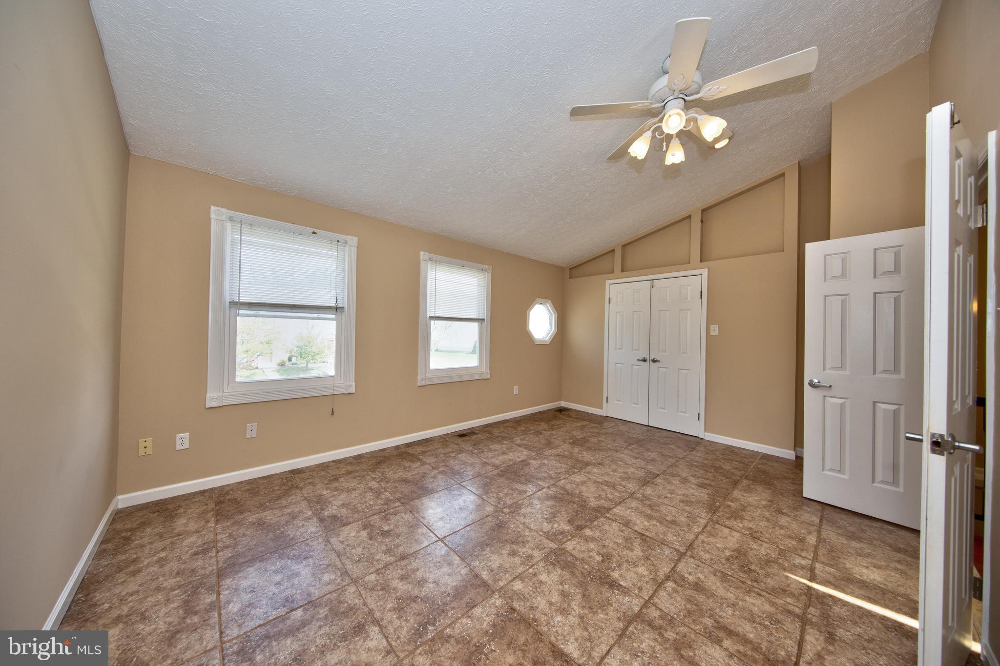 8728 Silver Hall Road Perry Hall, MD 21128 - Photo 15 of 29 Six panel doors and lighted ceiling fan