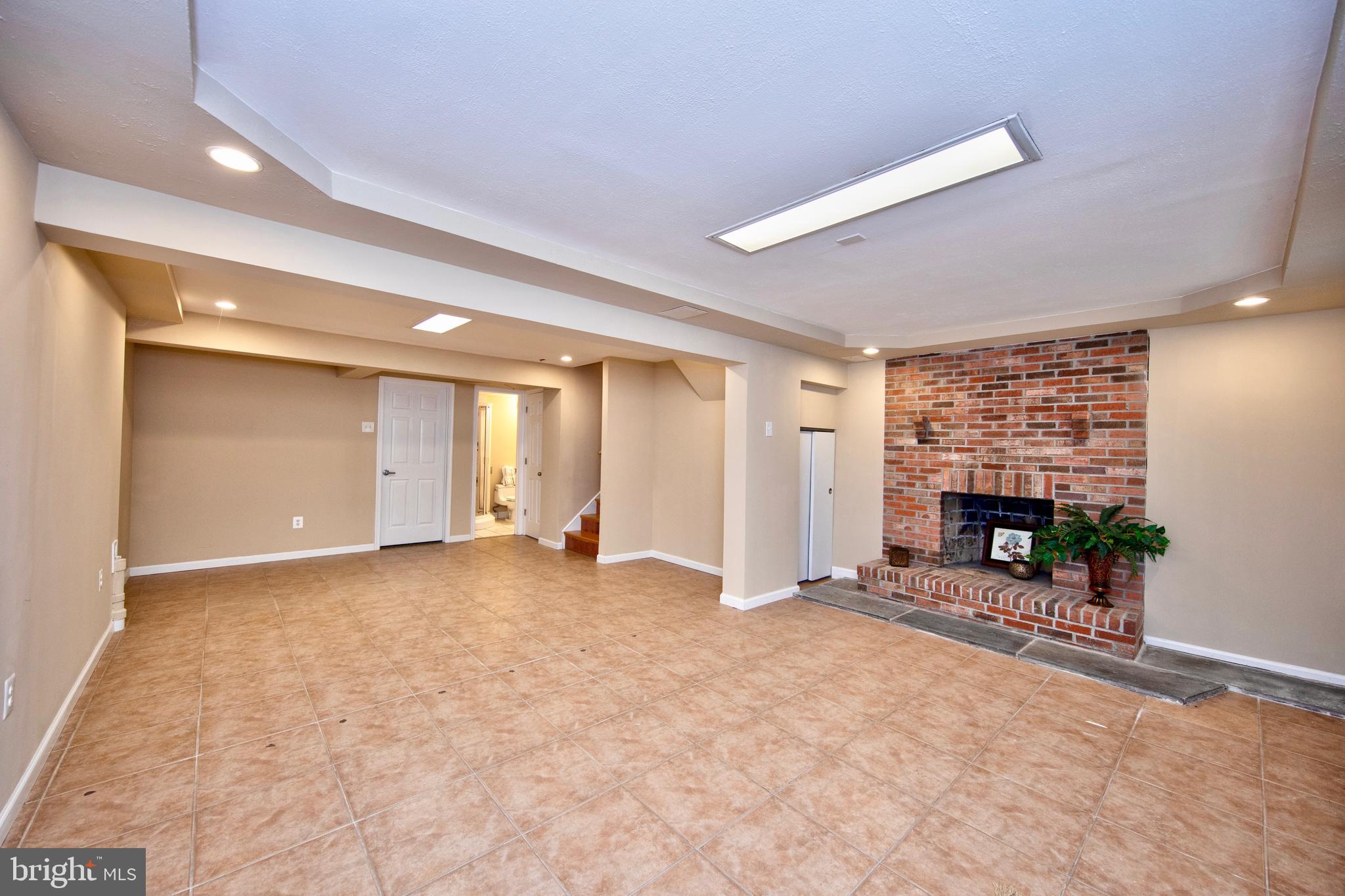 8728 Silver Hall Road Perry Hall, MD 21128 - Photo 25 of 29 Trey ceiling & Wood Burning Brick fireplace
