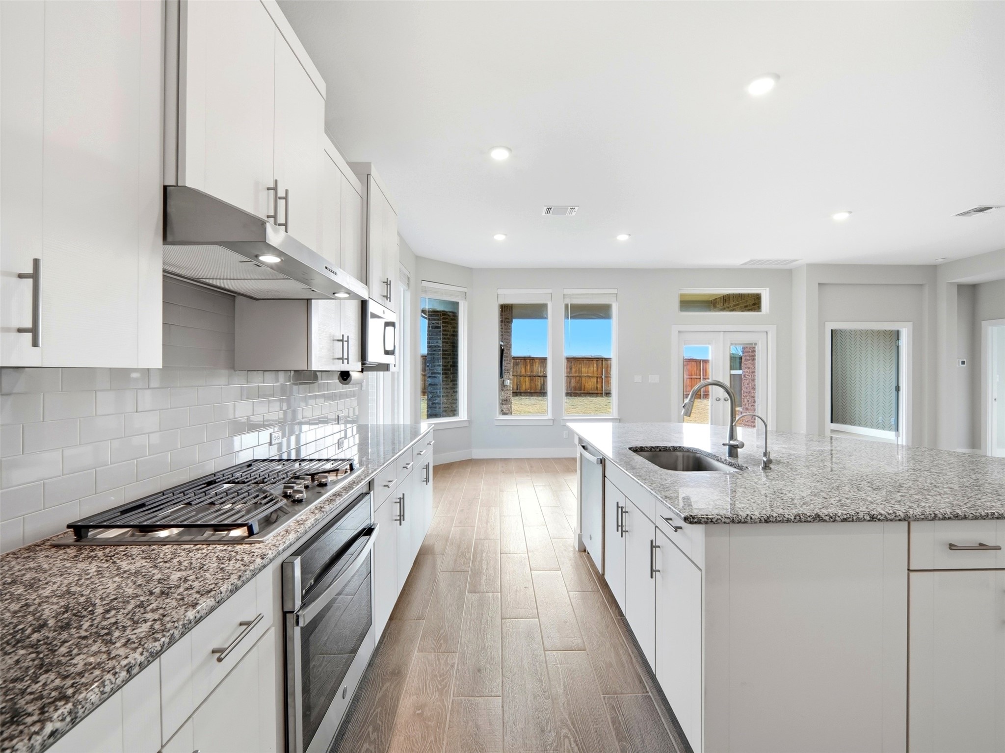 848 Wild Pecan Loop Buda, TX 78610 - Photo 20 of 49 Experience the luxury of pure, filtered water with a reverse osmosis system and dedicated spout. Enjoy cooking with a smart oven and gas stovetop.