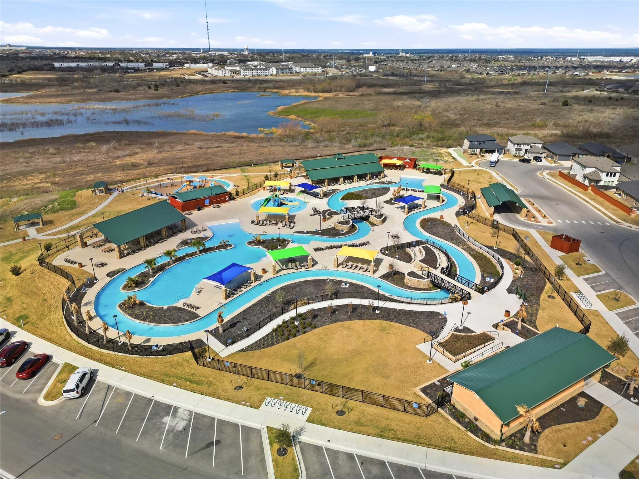 848 Wild Pecan Loop Buda, TX 78610 - Photo 22 of 49 Experience relaxation and leisure with this stunning community pool, complete with scenic pathways for a tranquil retreat.