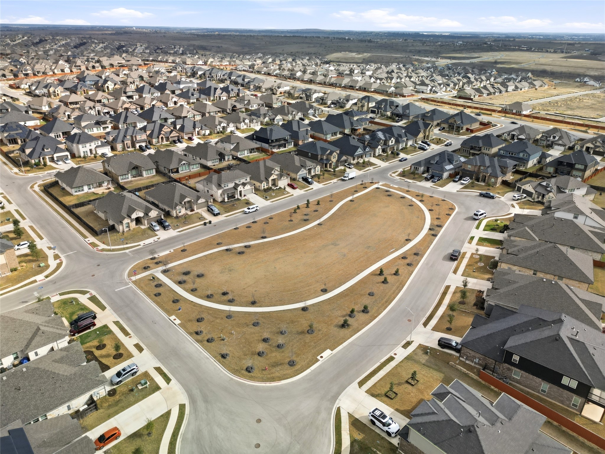 848 Wild Pecan Loop Buda, TX 78610 - Photo 30 of 49 Charming Pocket Park: Enjoy serene green space nestled in a vibrant community, perfect for relaxation and family activities.