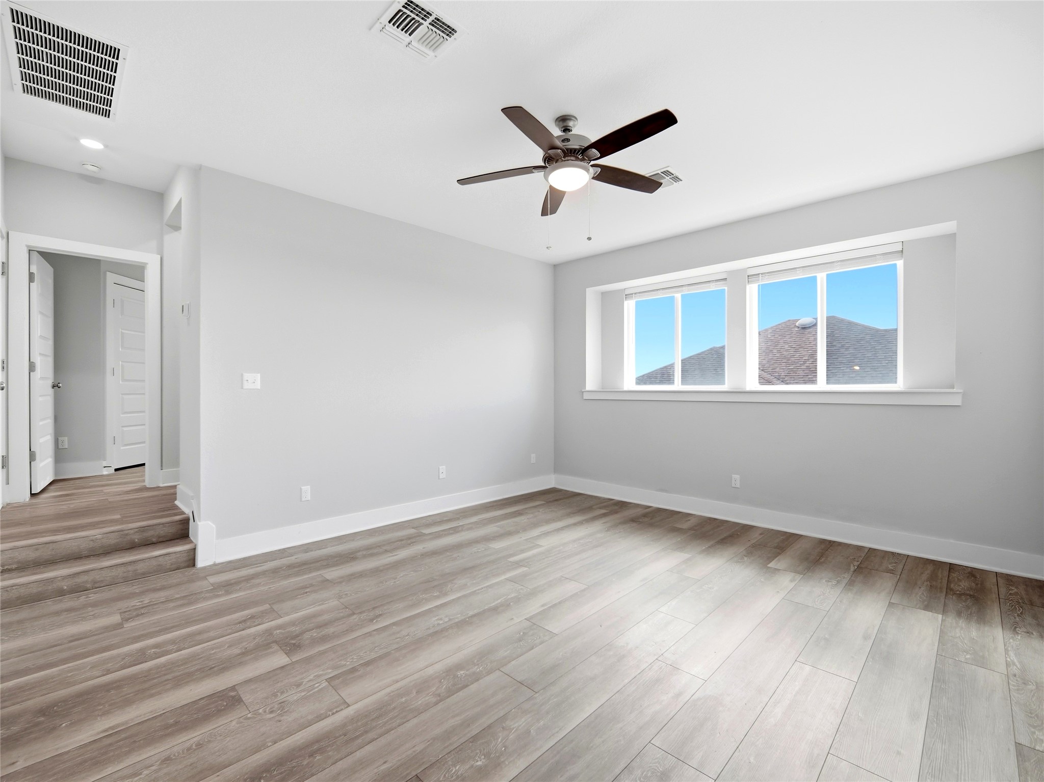 848 Wild Pecan Loop Buda, TX 78610 - Photo 35 of 49 Spacious upstairs retreat perfect for a game room or cozy living area.