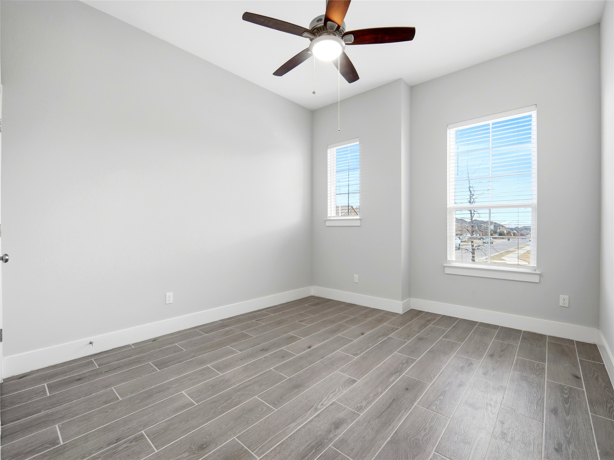 848 Wild Pecan Loop Buda, TX 78610 - Photo 41 of 49 bedroom with fan