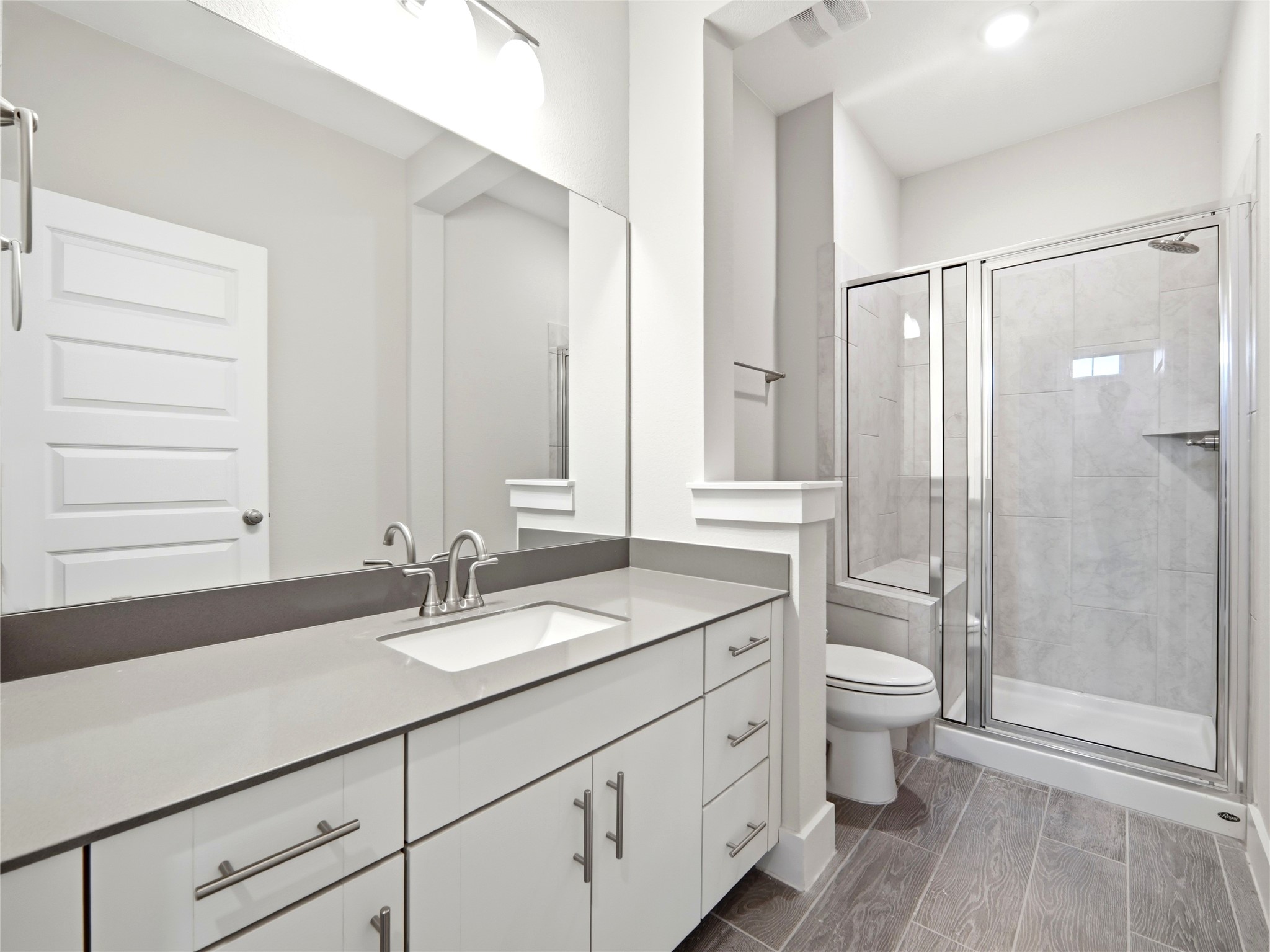 848 Wild Pecan Loop Buda, TX 78610 - Photo 46 of 49 Convenient full bathroom on the main floor.