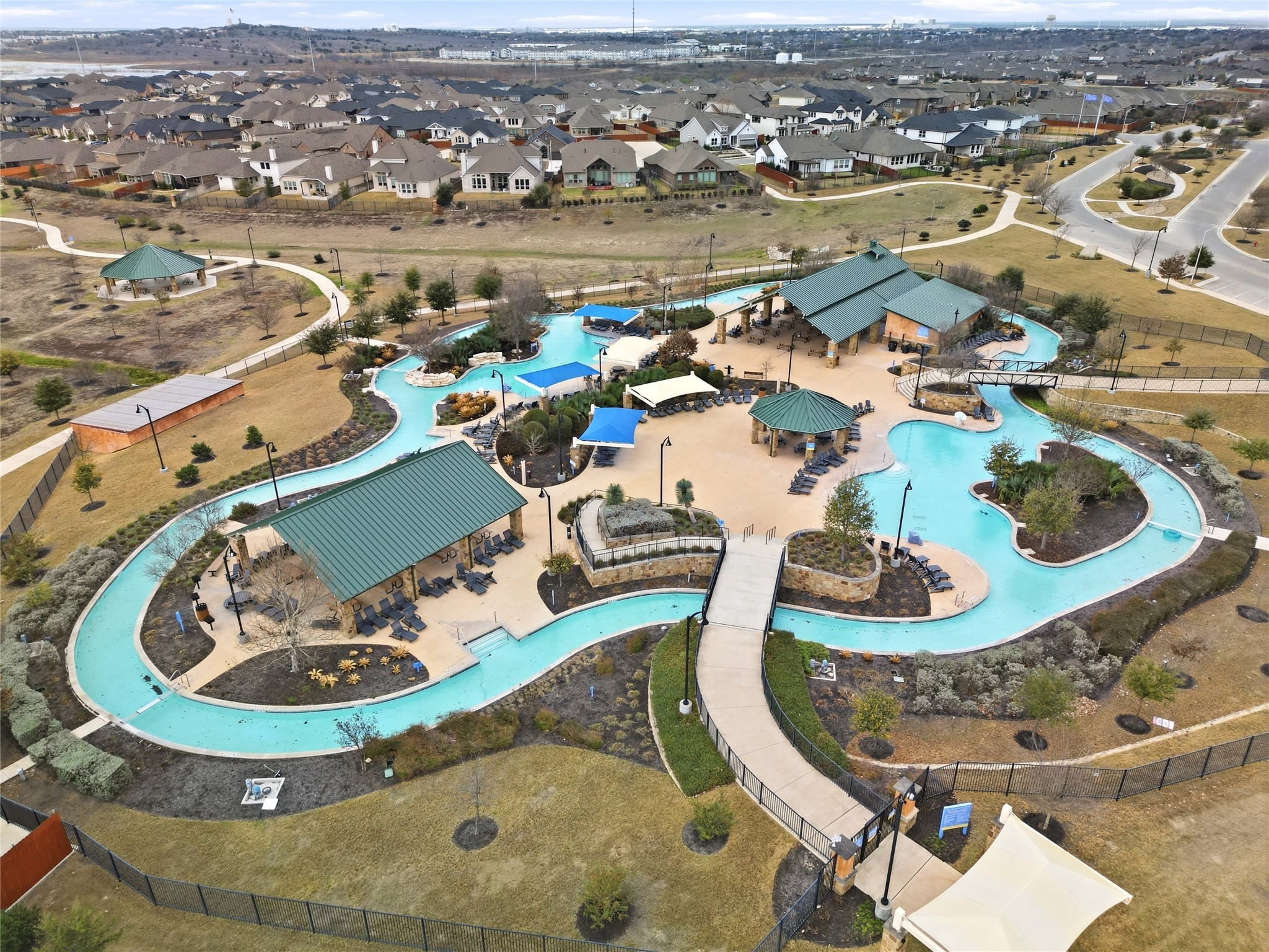 848 Wild Pecan Loop Buda, TX 78610 - Photo 47 of 49 Enjoy a resort-style community pool, perfect for relaxation and family fun.